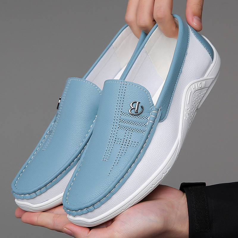 Men's fashion essential: Two-tone slip-on loafers, combining ease and elegance in one shoe.
