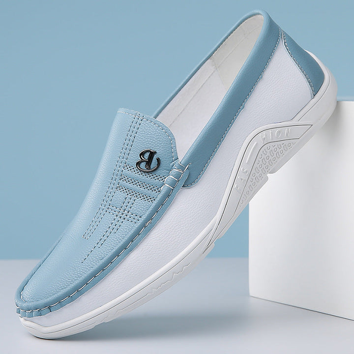Men's sophisticated two-tone slip-on dress shoes, a comfortable and elegant footwear option.