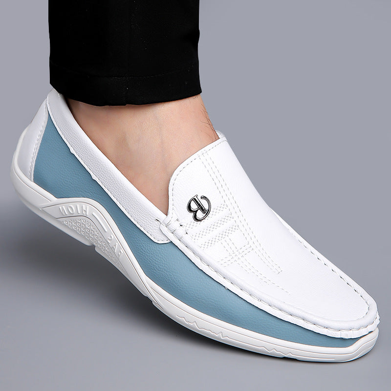 Close-up of men's two-tone slip-on loafers, showcasing intricate design and quality.