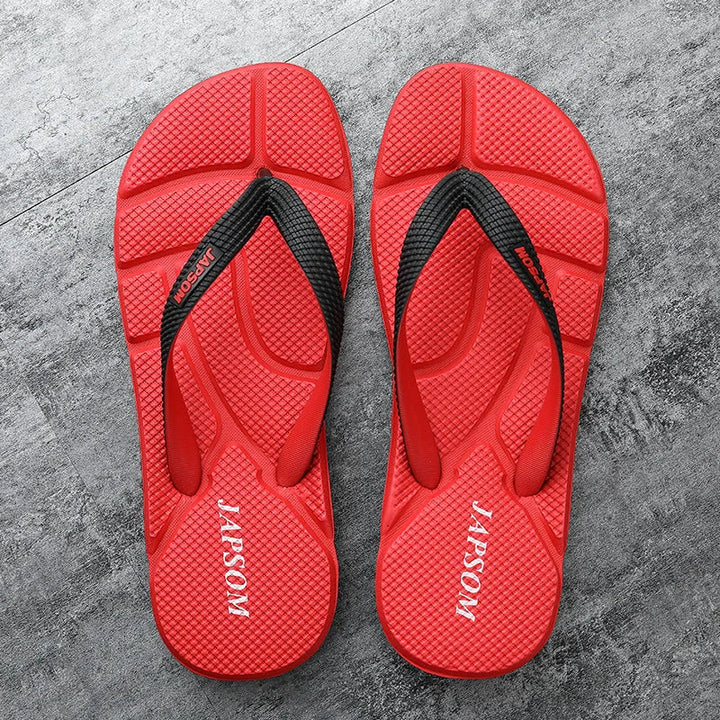Close-up of black men's massage sandals. Textured footbed provides ultimate comfort & foot relief. Summer essential.