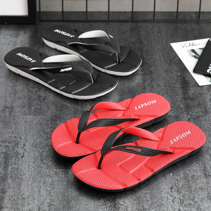 Pair of men's ultimate comfort flip flops. Ideal beach shoes, pool slides & casual wear. Non-slip for relaxation.