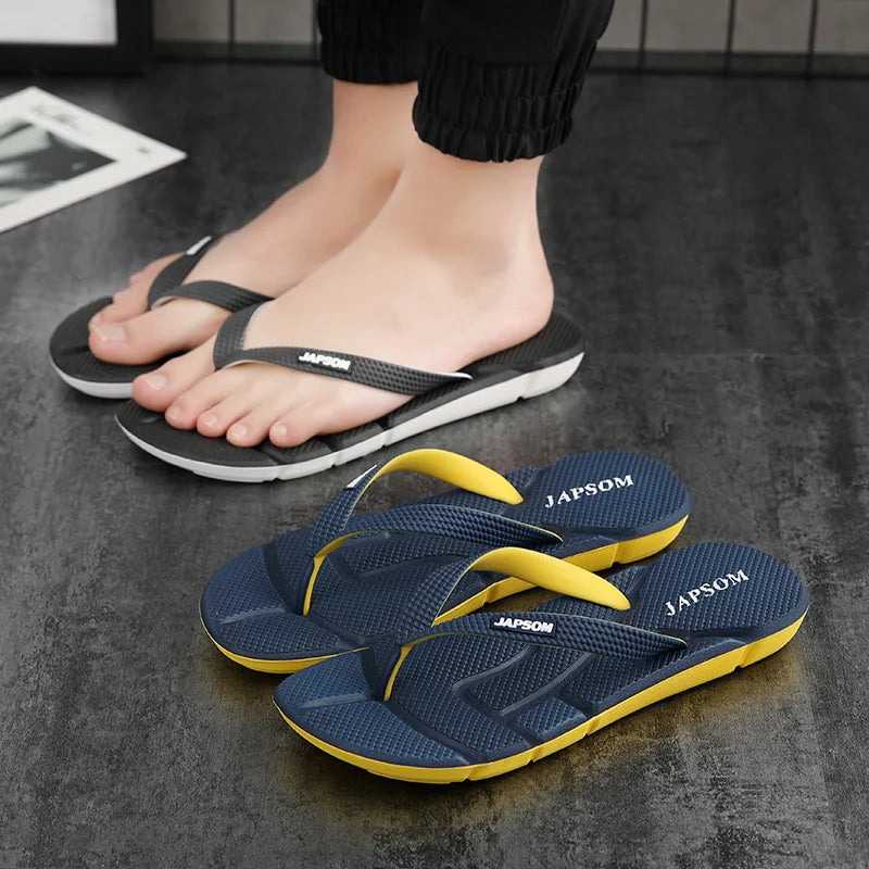 Man wearing men's ultimate comfort massage flip flops. Great for foot relief, relaxation & summer essential style.