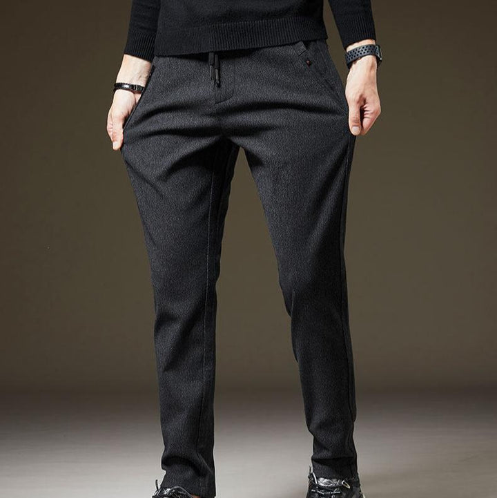 Modern men's slim fit casual pants. Experience everyday comfort & tailored style with these versatile trousers.