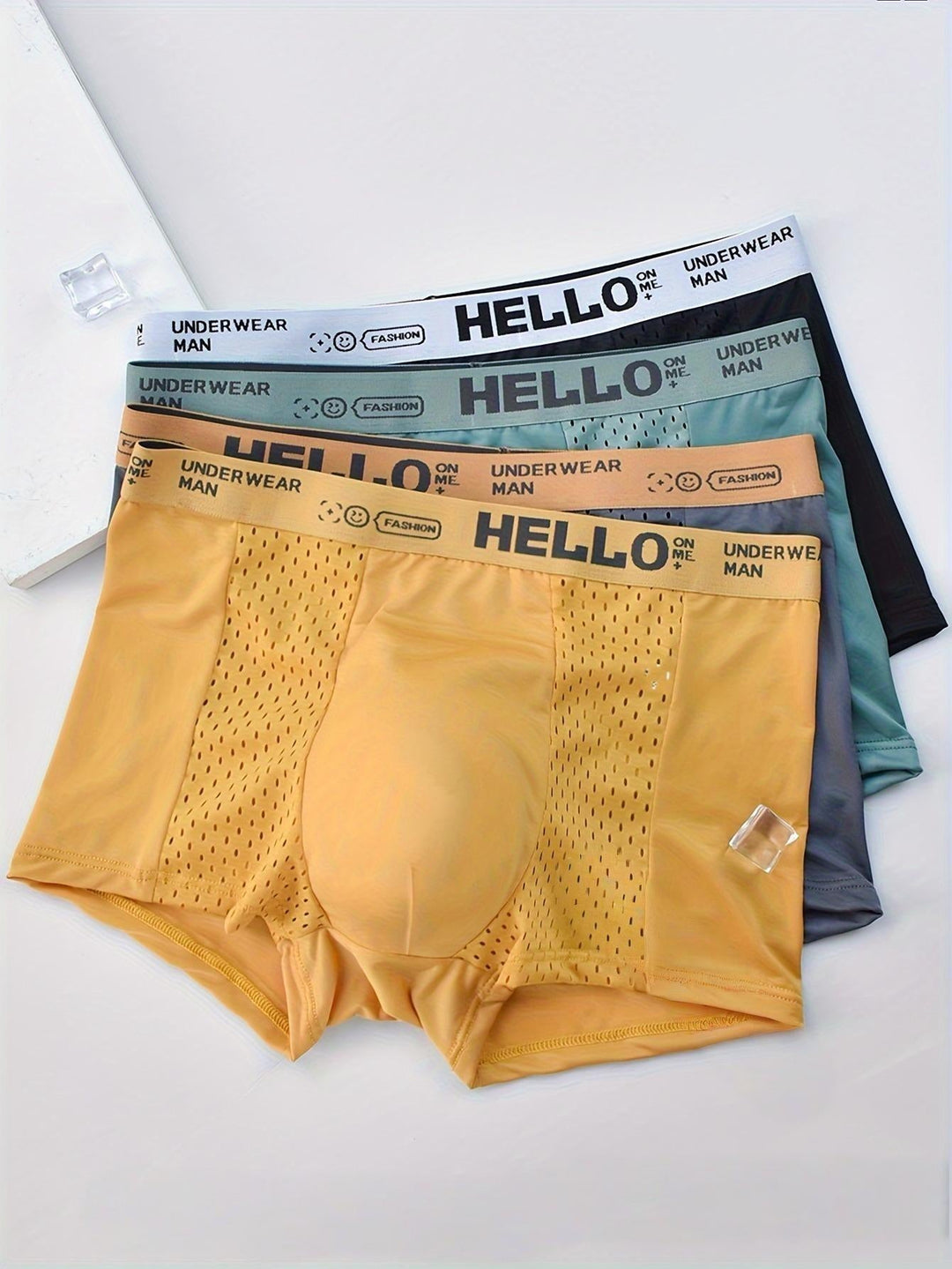 Soft, stretchy mesh boxer briefs for men, ultimate breathable comfort & quick dry activewear.