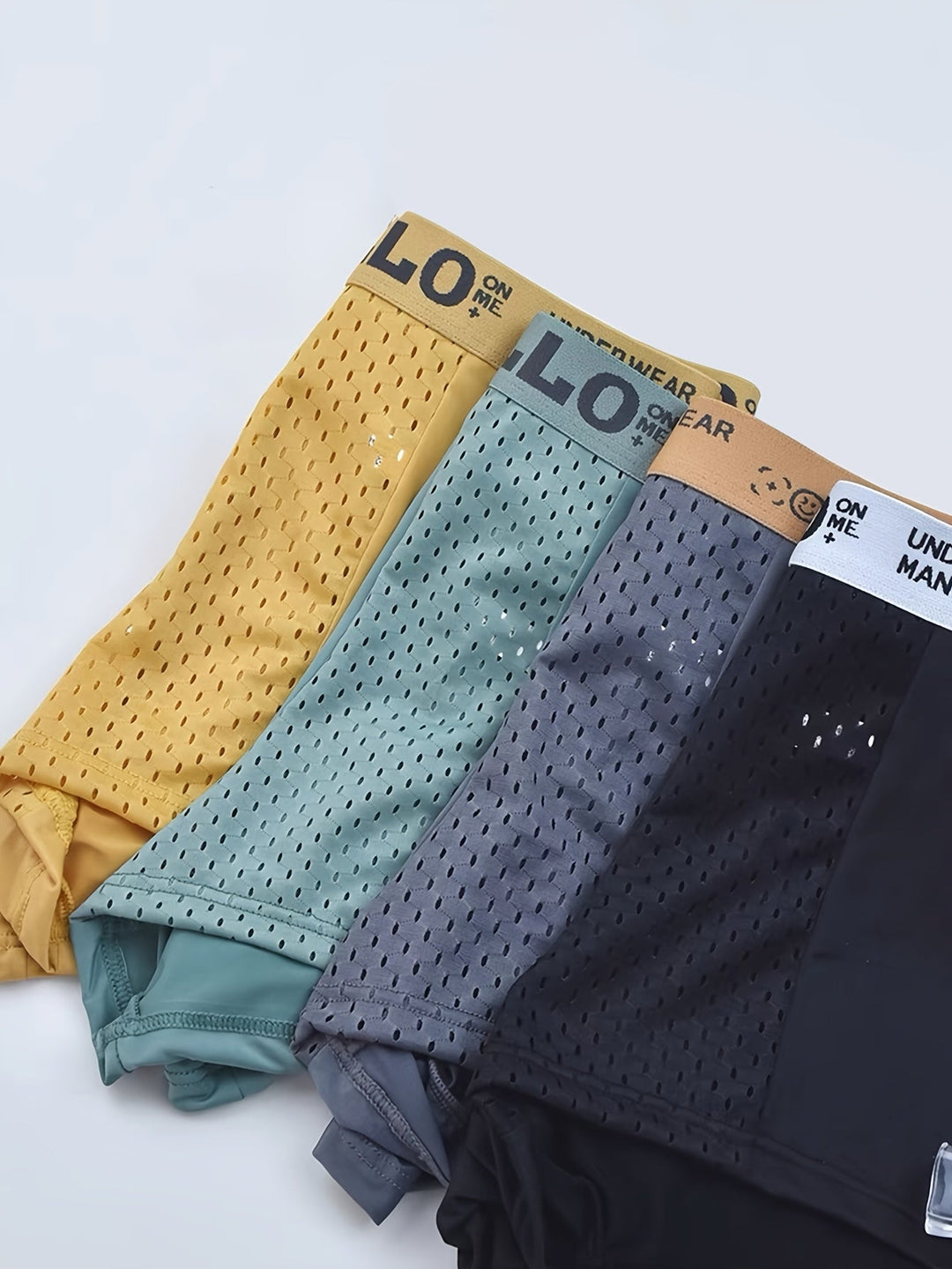 Performance men's mesh boxer briefs, ultra-breathable & quick-dry for athletic comfort.