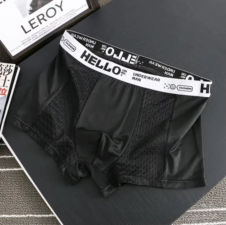 Ergonomic men's breathable mesh boxer briefs, designed for athletic support & all-day comfort.