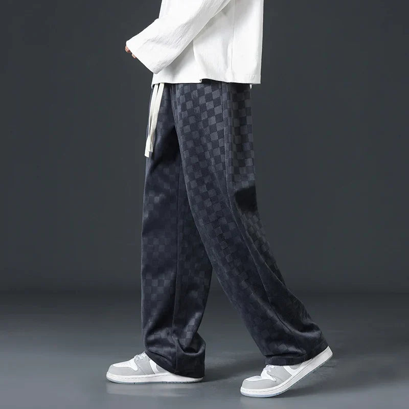 Soft, essential gray men's sweatpants, ultra-comfortable for home lounging or versatile casual wear.