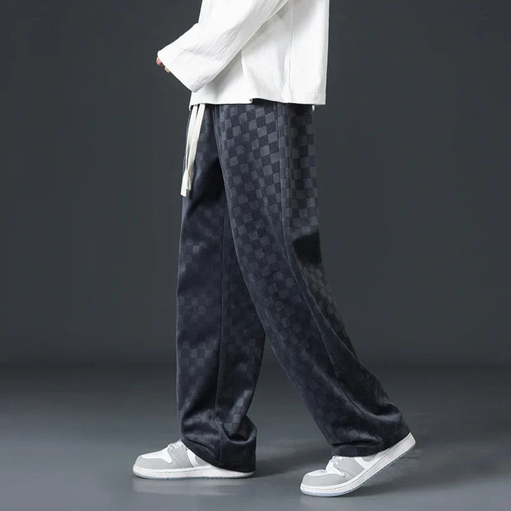 Soft, essential gray men's sweatpants, ultra-comfortable for home lounging or versatile casual wear.