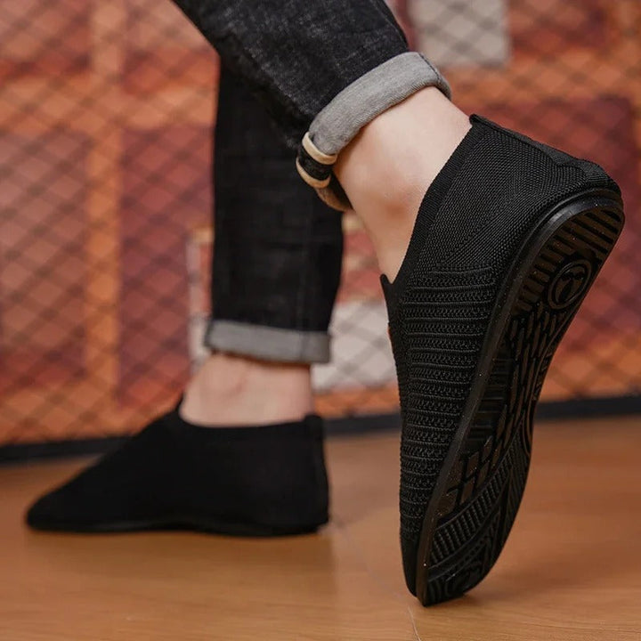 Casual men's AirKnit walking shoes, ultra-light and easy slip-on design.