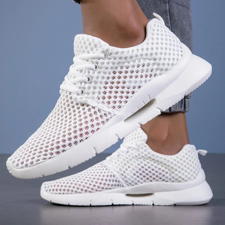 Men's ultra-light breathable white athletic sneakers, perfect for running, walking & daily comfort.