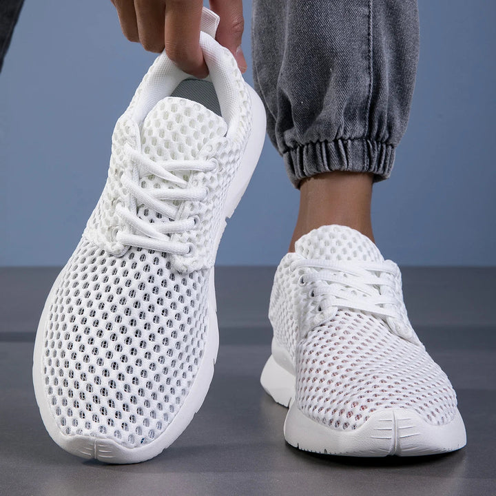 Dynamic men's running shoes, ultra-light design ensures comfort for intense athletics & training sessions.