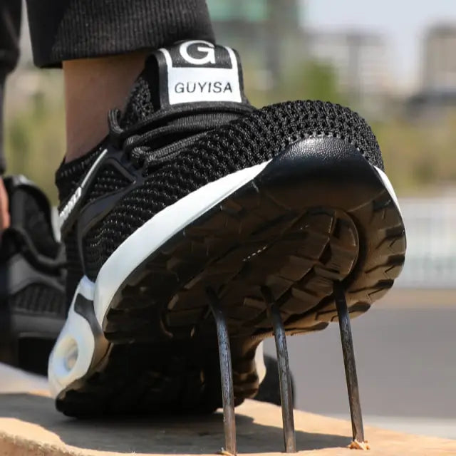 Sporty men's protective footwear: breathable, ultra-lightweight orthopedic safety shoes with steel toe for active workers.