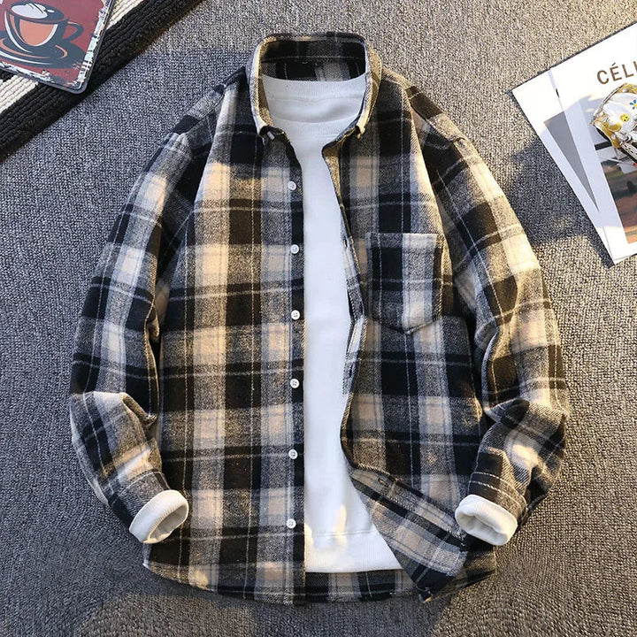 Ultra-soft men's plaid shirt, perfect for layering over a tee in fall weather.