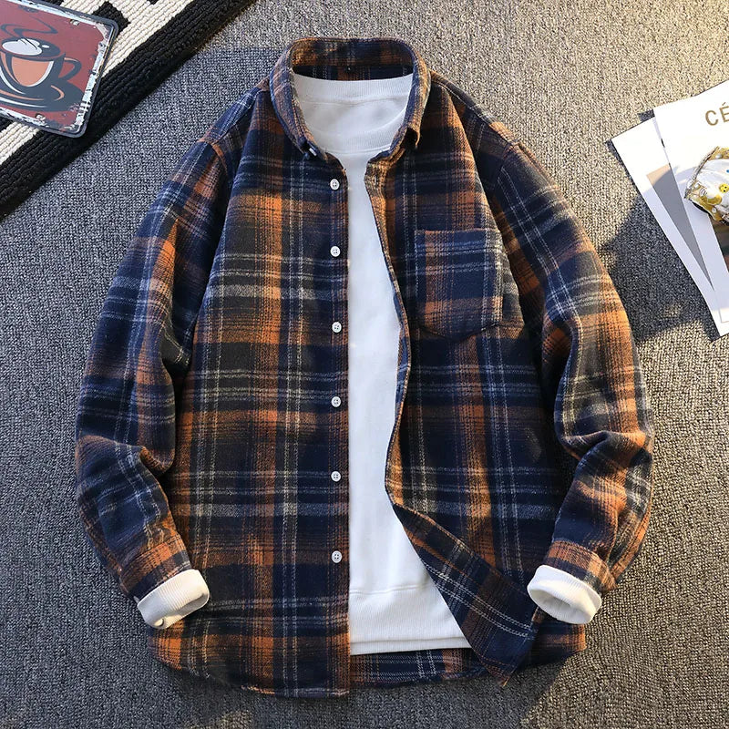 Stylish men's button-down plaid shirt, modern fit, showcasing soft fabric.