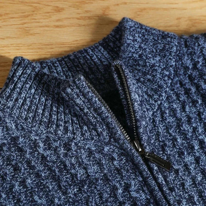 Close-up of men's ultra-soft knit pullover sweater, highlighting the luxurious texture and comfort.