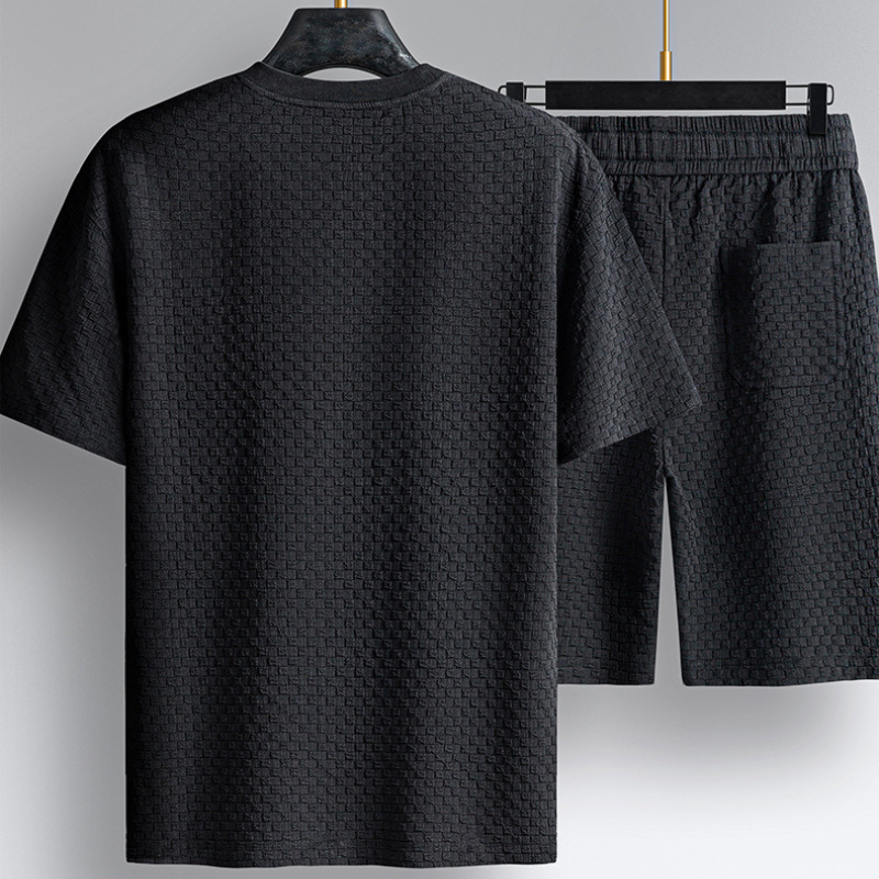 Cozy men's ultra-soft two-piece loungewear set featuring relaxed fit capri pants for ultimate home comfort.