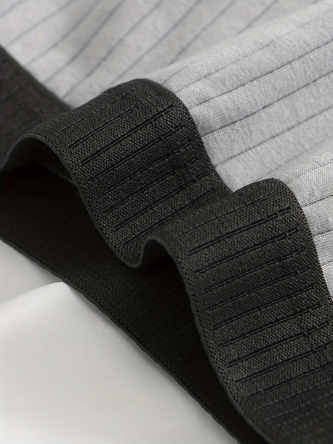 Chafe-free men's ribbed boxer briefs in a 6-pack, ultra-soft modal for daily wear.