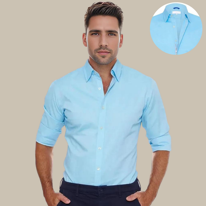 Easy-care Men's UltraFlex long-sleeve zip shirt. Wrinkle-free design ensures a professional & comfortable look.