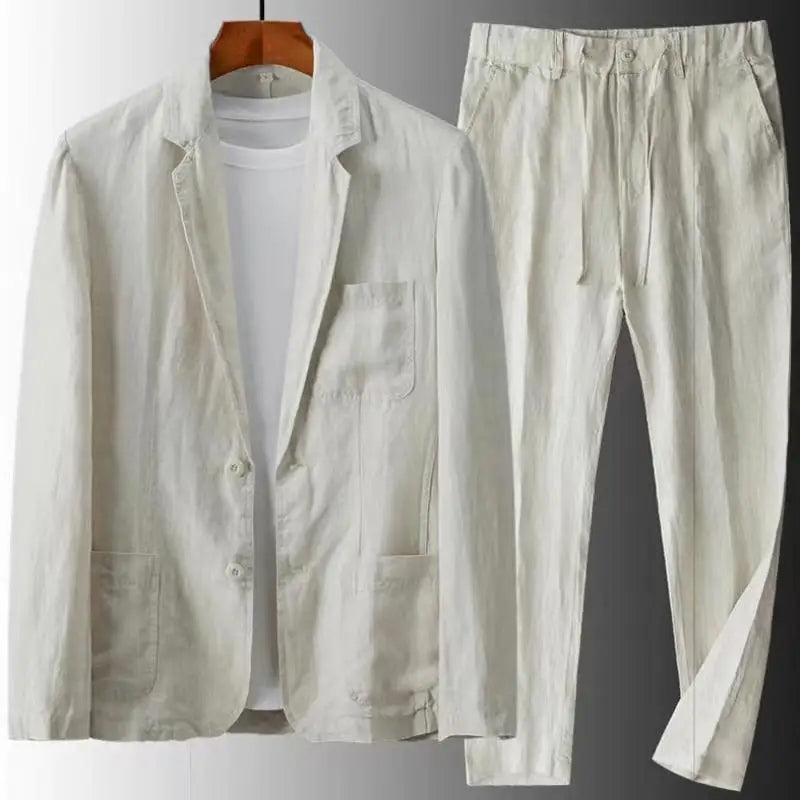 Comfortable men's linen two-piece set. Features a casual top & matching trousers for a relaxed, stylish summer look.
