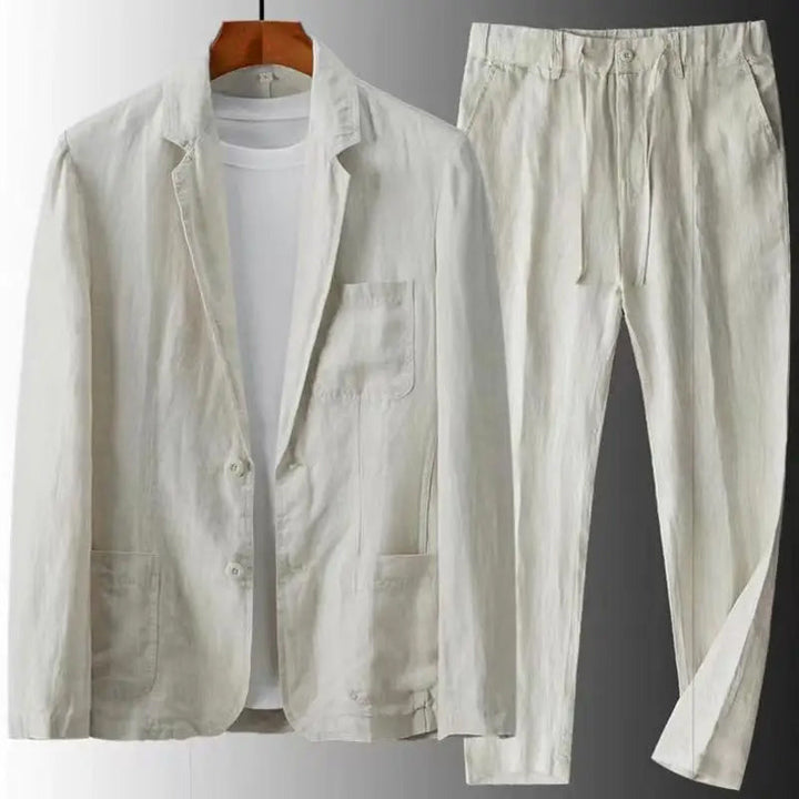 Comfortable men's linen two-piece set. Features a casual top & matching trousers for a relaxed, stylish summer look.