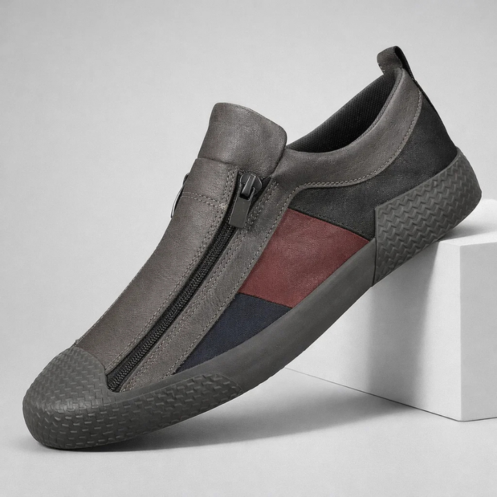 Men's modern sneakers in a sleek design, offering urban comfort and stylish versatility for casual wear.