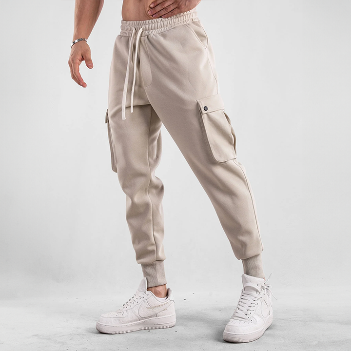 Soft French Terry men's cargo joggers, flexible fit with elastic waistband and cuffs for ultimate comfort.