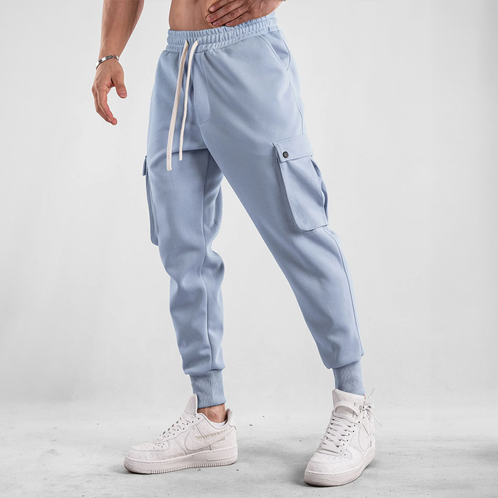 Streetwear men's bottoms: Urban Flex Cargo Joggers with soft lining, offering a warm and relaxed fit.
