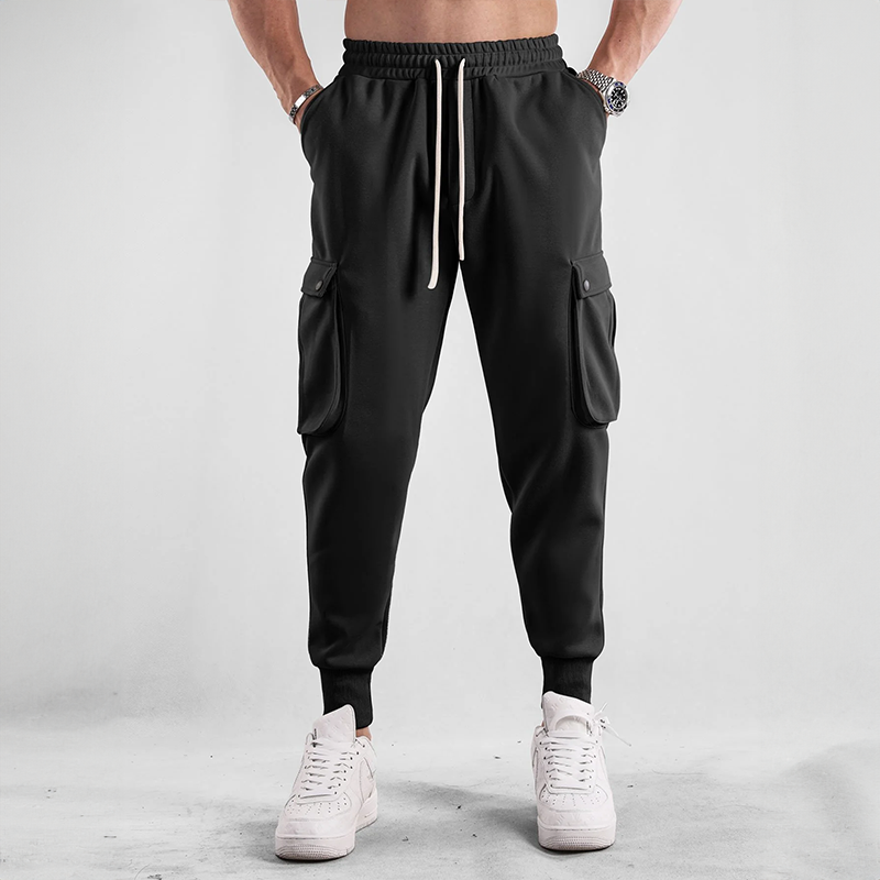 Close-up of men's cargo jogger fabric, highlighting the stretch and durable French Terry material.
