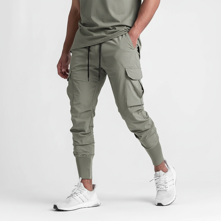 Men's stretch fabric jogger pants, comfort fit with urban performance design & functional pockets.