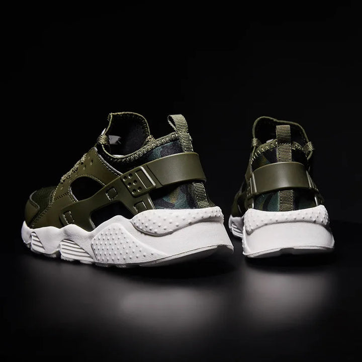 Breathable men's athletic street sneakers with a traction sole for urban comfort and style.