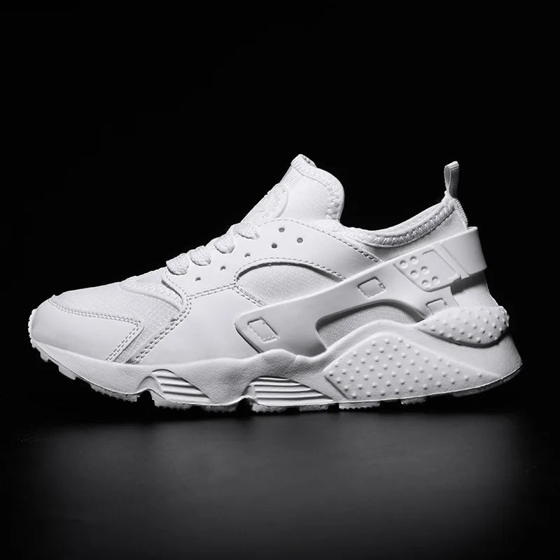 Close-up of men's urban street sneakers, highlighting breathable fabric and sturdy durable construction.