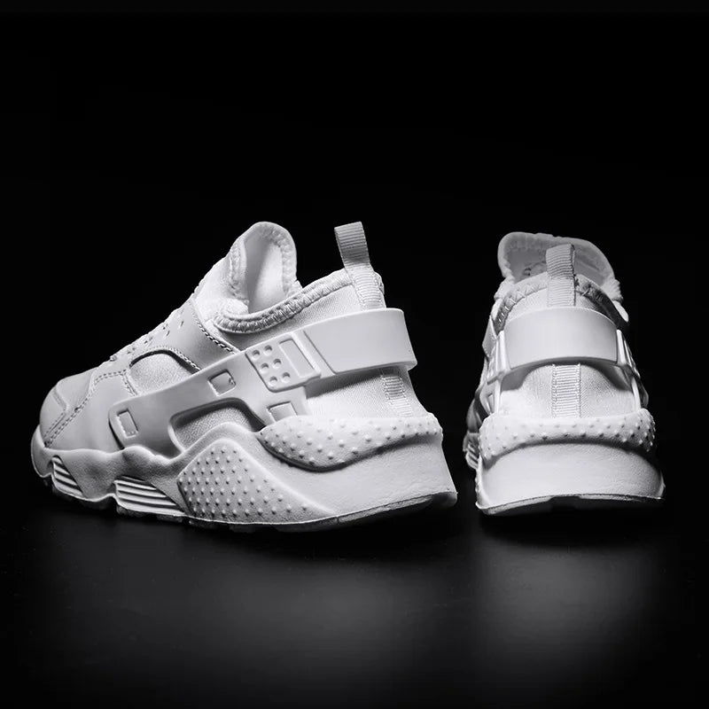 Side profile of men's durable urban street sneakers, showing athletic design and comfortable fit.