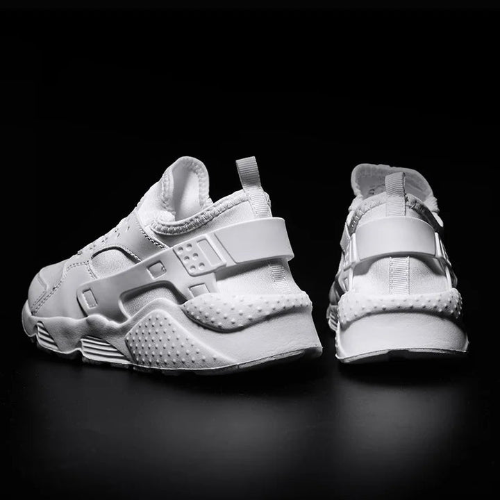 Side profile of men's durable urban street sneakers, showing athletic design and comfortable fit.