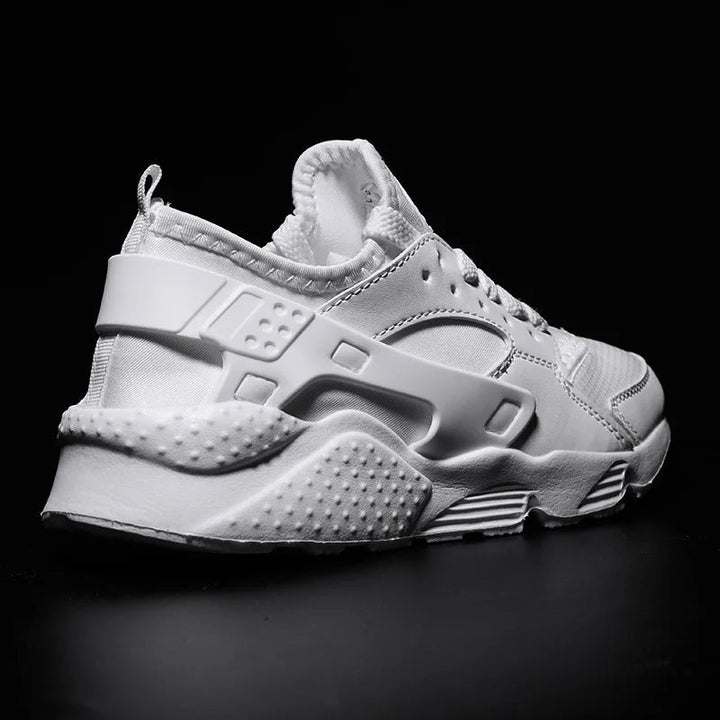 Detail of traction sole on men's urban street sneakers, ensuring grip and stability for everyday wear.