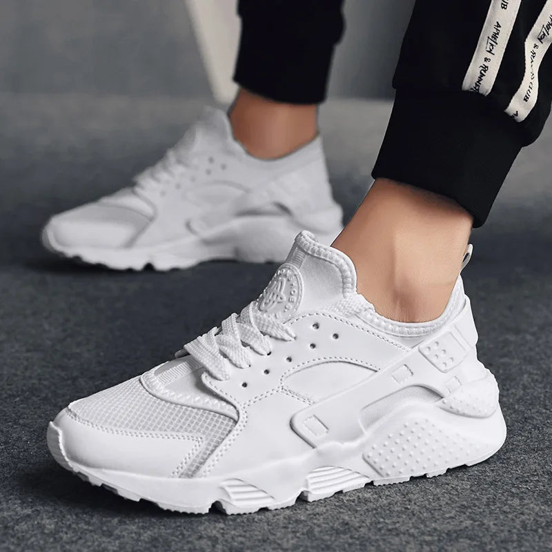 Front view of men's casual street sneakers, emphasizing urban style and all-day comfort features.