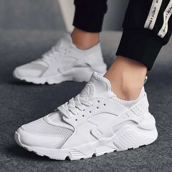 Front view of men's casual street sneakers, emphasizing urban style and all-day comfort features.
