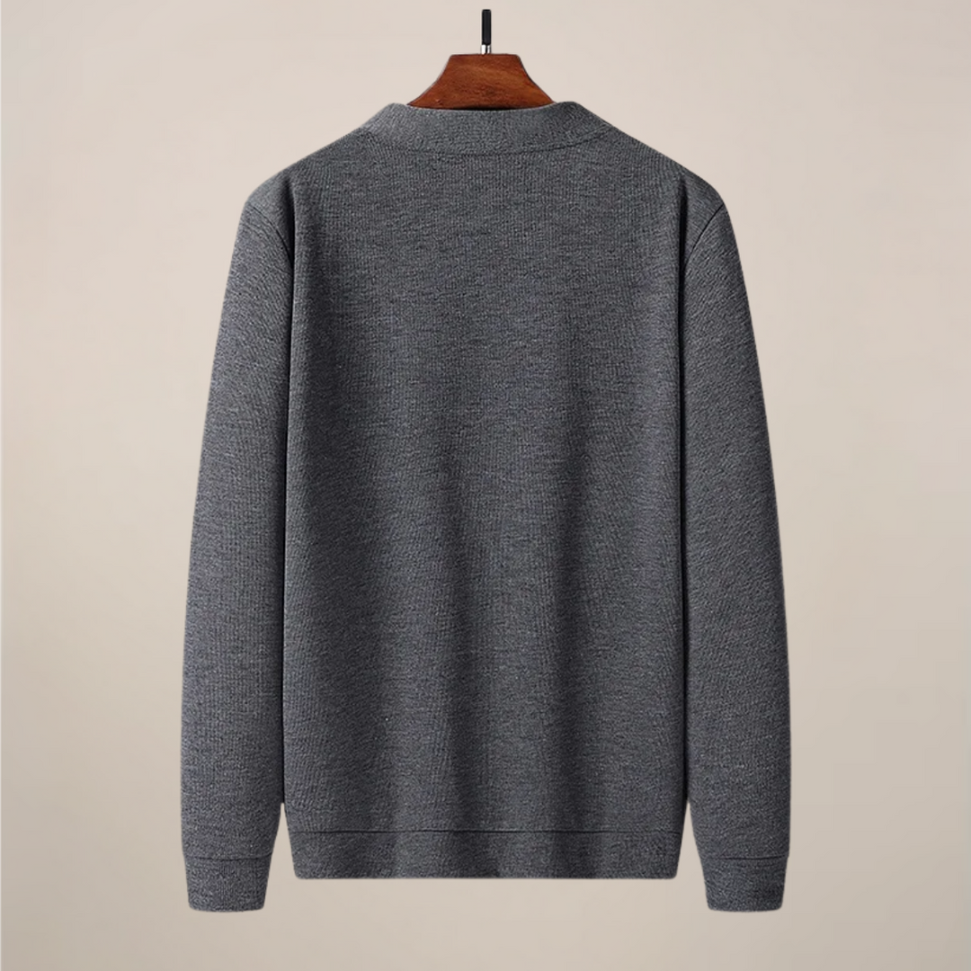 Stylish men's V-neck cardigan sweater with practical front pockets, perfect for casual or smart-casual layering.