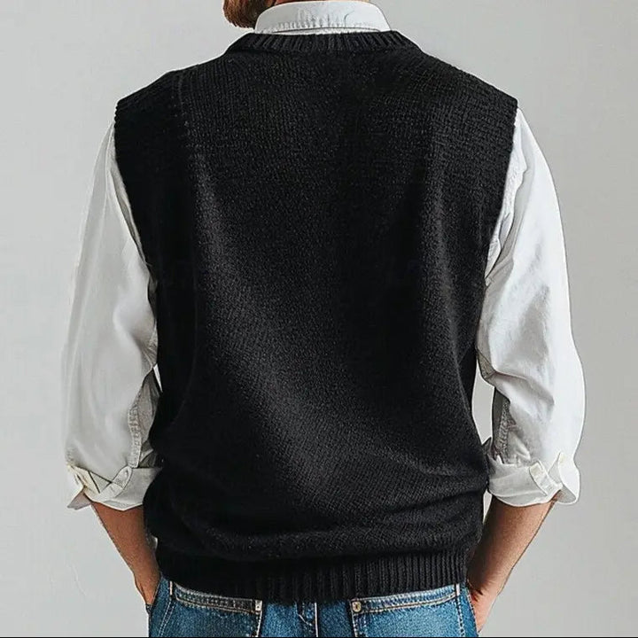 Black men's V-neck knit vest for versatile layering. Essential smart casual and office wear fashion.