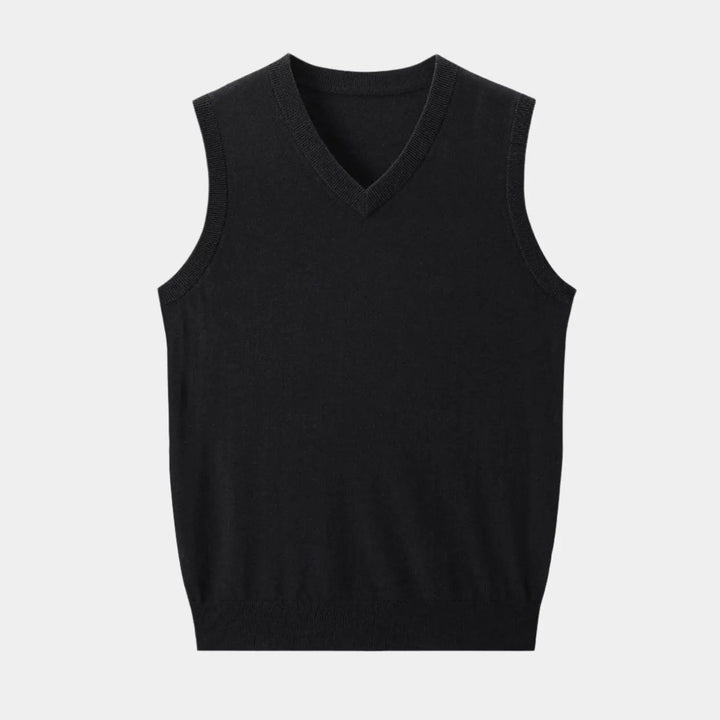 Dark blue men's V-neck knit layering vest. Essential knitwear for men's smart casual and office style.