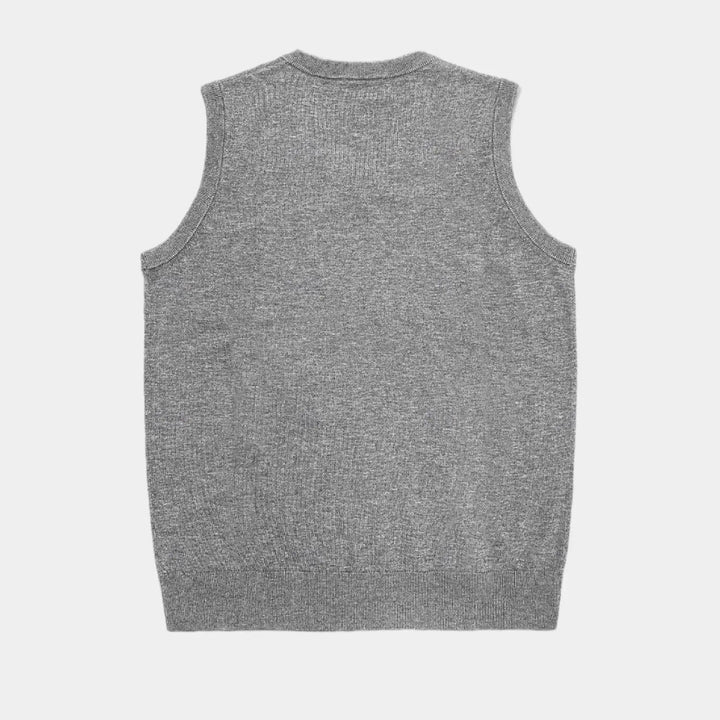 Stylish men's V-neck knit vest, enhancing smart casual and professional office wear outfits with elegant layering.