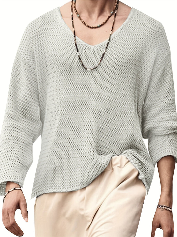 Stylish men's V-neck knitted top with long sleeves, ideal for layering or stand-alone wear.