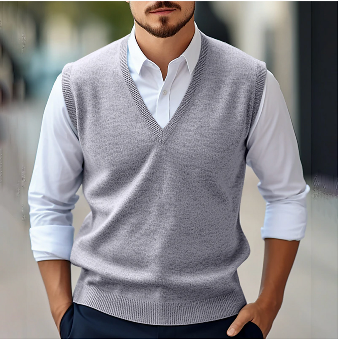 Tailored fit men's V-neck sweater vest. Elegant sleeveless knitwear, perfect for business and smart casual looks.