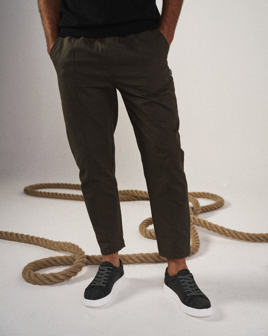 Rear view of Men's Valencia tapered joggers, featuring practical pockets & sleek design for mens bottoms.