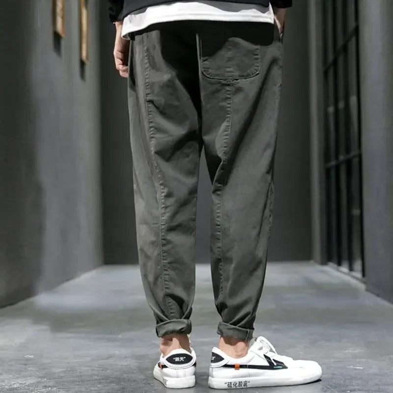 Model showcasing Men's Valencia tapered joggers for ultimate comfort in everyday casual wear.