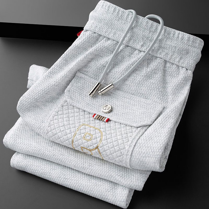 Stylish men's Vellaros activewear joggers, perfect for workouts, lounging, or modern streetwear fashion.