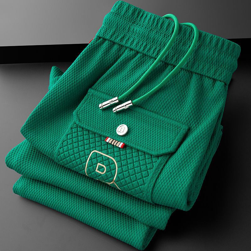 Comfortable men's Vellaros athletic pants with a modern tapered fit, suitable for daily casual wear.