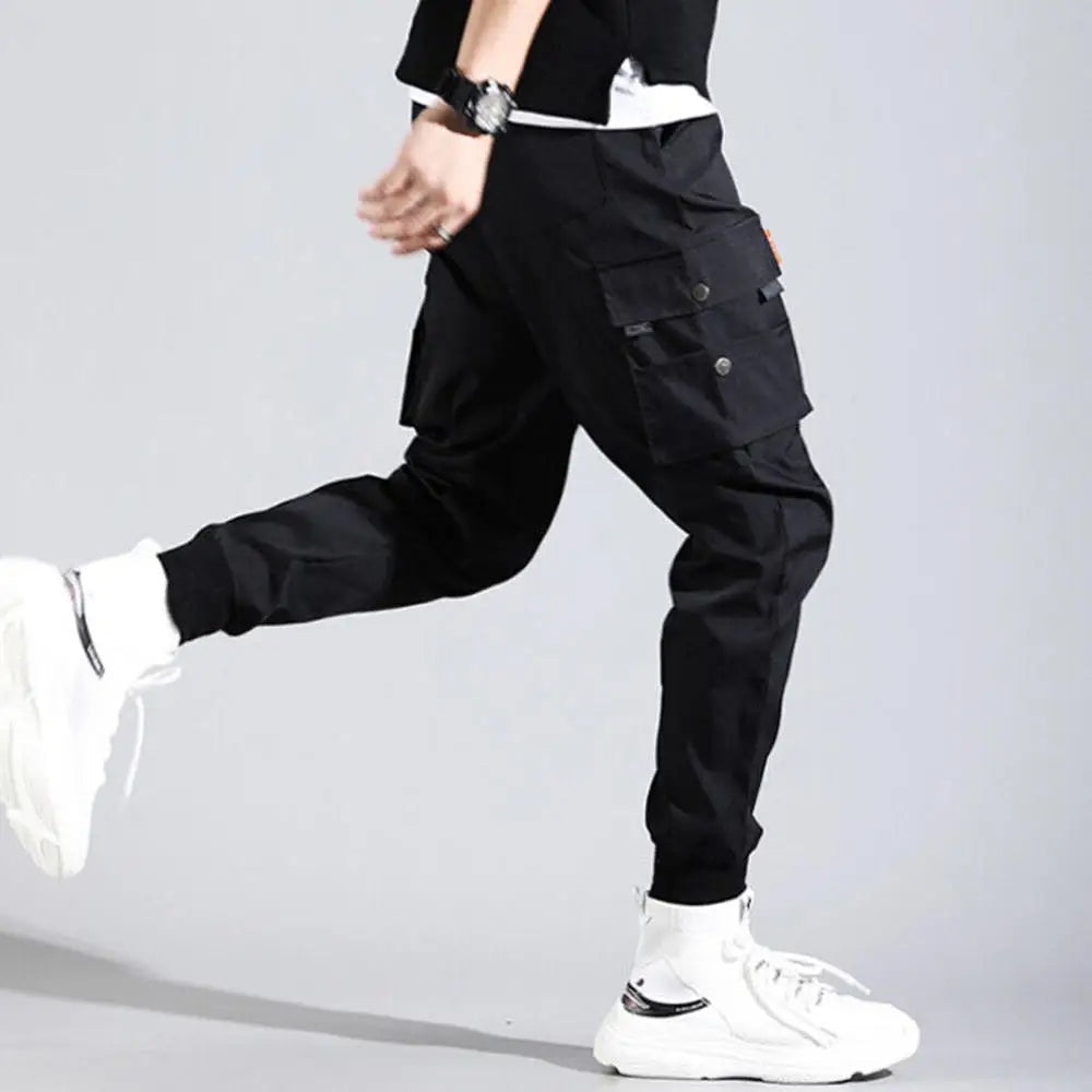 Stylish men's cargo joggers featuring an athletic fit, multiple pockets, and elastic cuffs for versatile wear.
