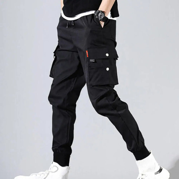 Modern men's streetwear cargo joggers, versatile and comfortable, ideal for urban casual fashion.