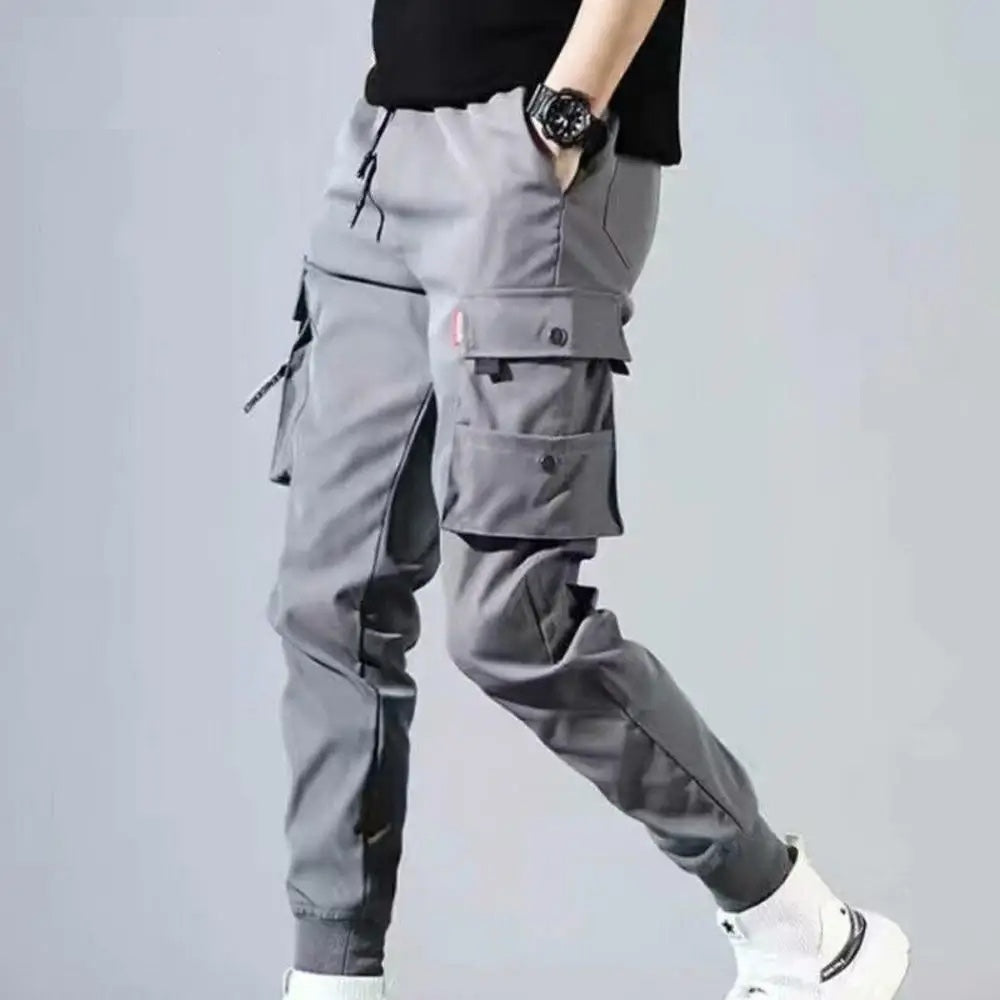 Comfortable men's Velocity joggers, featuring cargo pockets for utility and an elastic waist for fit.