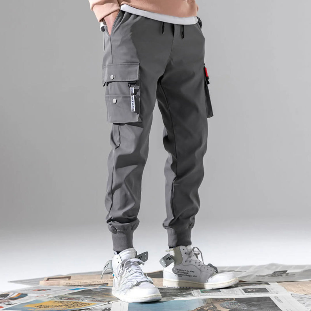 Men's Velocity tapered leg cargo joggers with a comfortable drawstring waist and elastic cuffs for style.